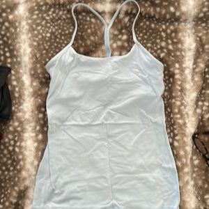 Light blue lululemon athletic too with built in sports bra in fair condition